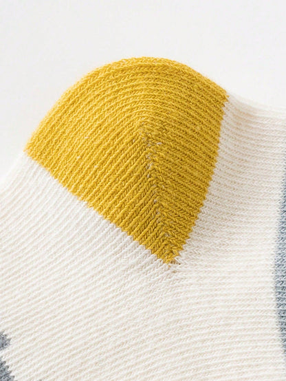 زوج واحد من الجوارب المخططة على شكل ديناصور وأسد