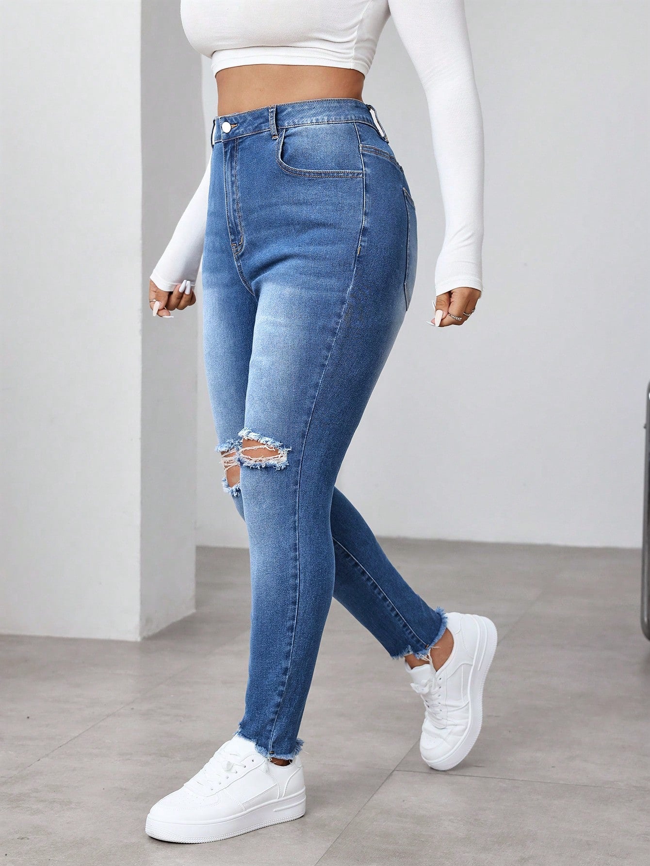 جينز ناعم البناء مغسول مشوه المقاس الكبير