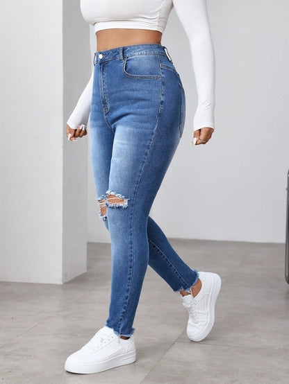 جينز ناعم البناء مغسول مشوه المقاس الكبير