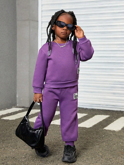 سترة تسخير وبنطلون رياضي متدلي الكتابة الخاصة بالفتاة الصغيرة