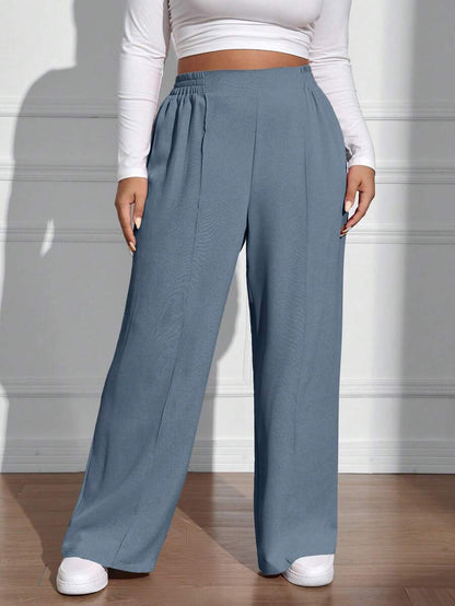سراويل فضفاضة كاجوال واسعة الساق ذات خصر مطاطي موحد اللون للنساء بمقاسات كبيرة