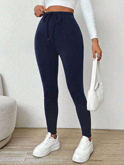 سراويل رياضية لنساء بلون أحادي مع ربطة خصر