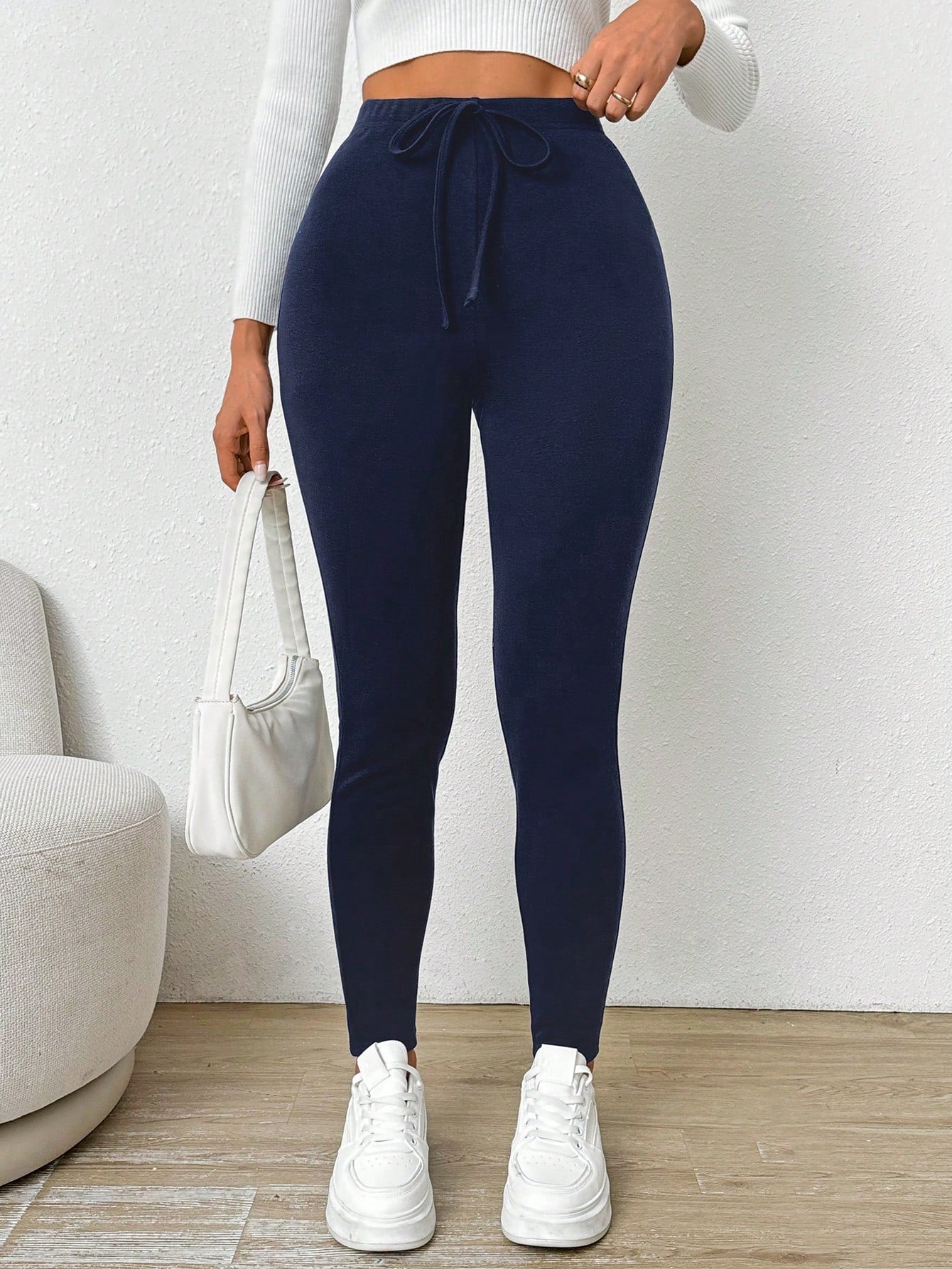 سراويل رياضية لنساء بلون أحادي مع ربطة خصر ، من القماش الفلينى