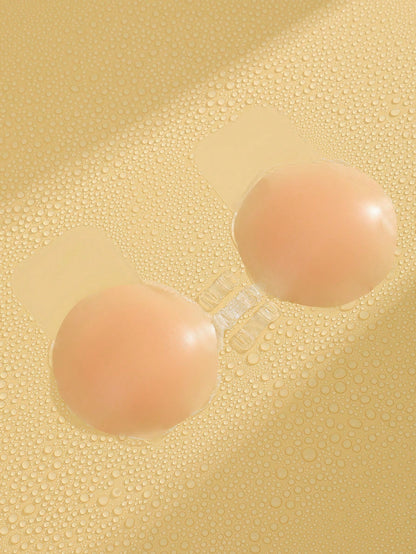 زوج من لاصقات ثدي السيليكون لرفع الصدر باللون المشمشي والشكل الكروي للنساء