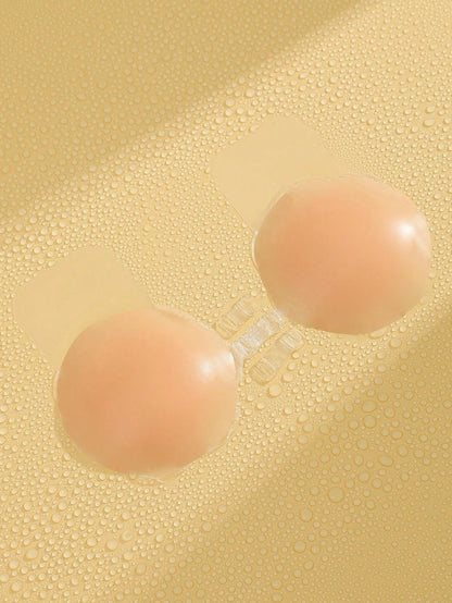 زوج من لاصقات ثدي السيليكون لرفع الصدر باللون المشمشي والشكل الكروي للنساء