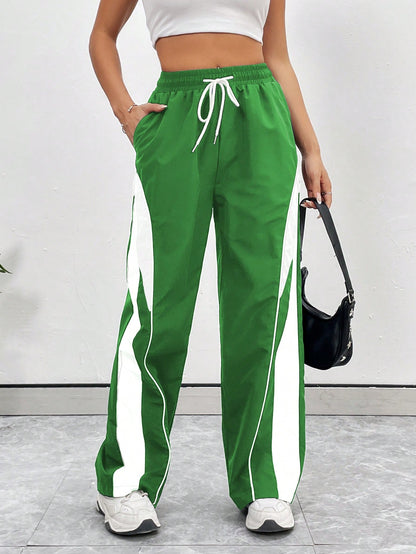 بنطال رياضي كاجوال بسيط بلون سادة وجيب برباط أمامي