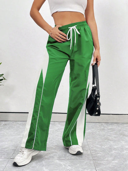 بنطال رياضي كاجوال بسيط بلون سادة وجيب برباط أمامي