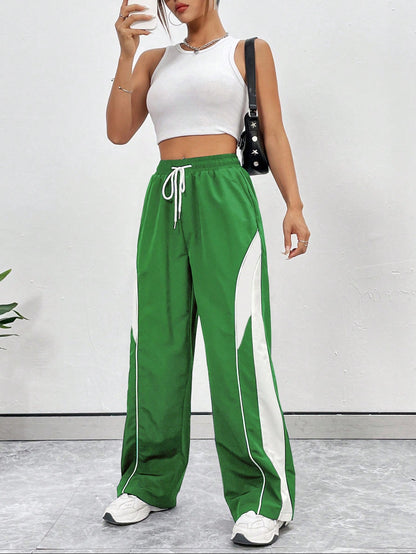 بنطال رياضي كاجوال بسيط بلون سادة وجيب برباط أمامي