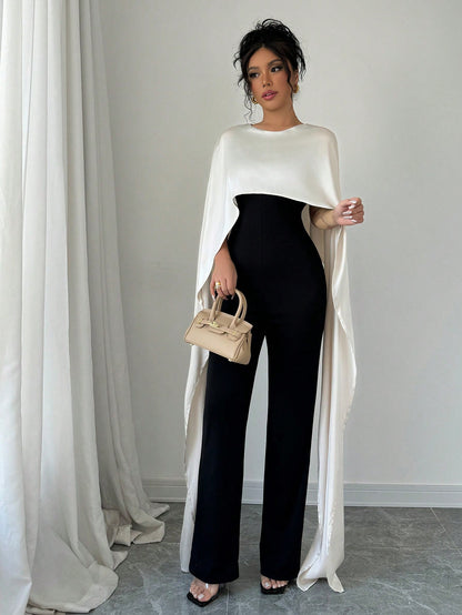 بدلة إكسسوار حريمي أنيقة 2 في 1 ، مرقع بالاريب نيت ، ياقة مستديرة مع شق في الخلف، ألوان متباينة البرتقالي والأسود ، مناسبة للخريف/الشتاء