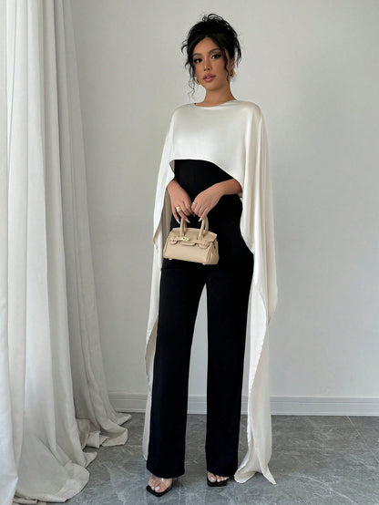 بدلة إكسسوار حريمي أنيقة 2 في 1 ، مرقع بالاريب نيت ، ياقة مستديرة مع شق في الخلف، ألوان متباينة البرتقالي والأسود ، مناسبة للخريف/الشتاء