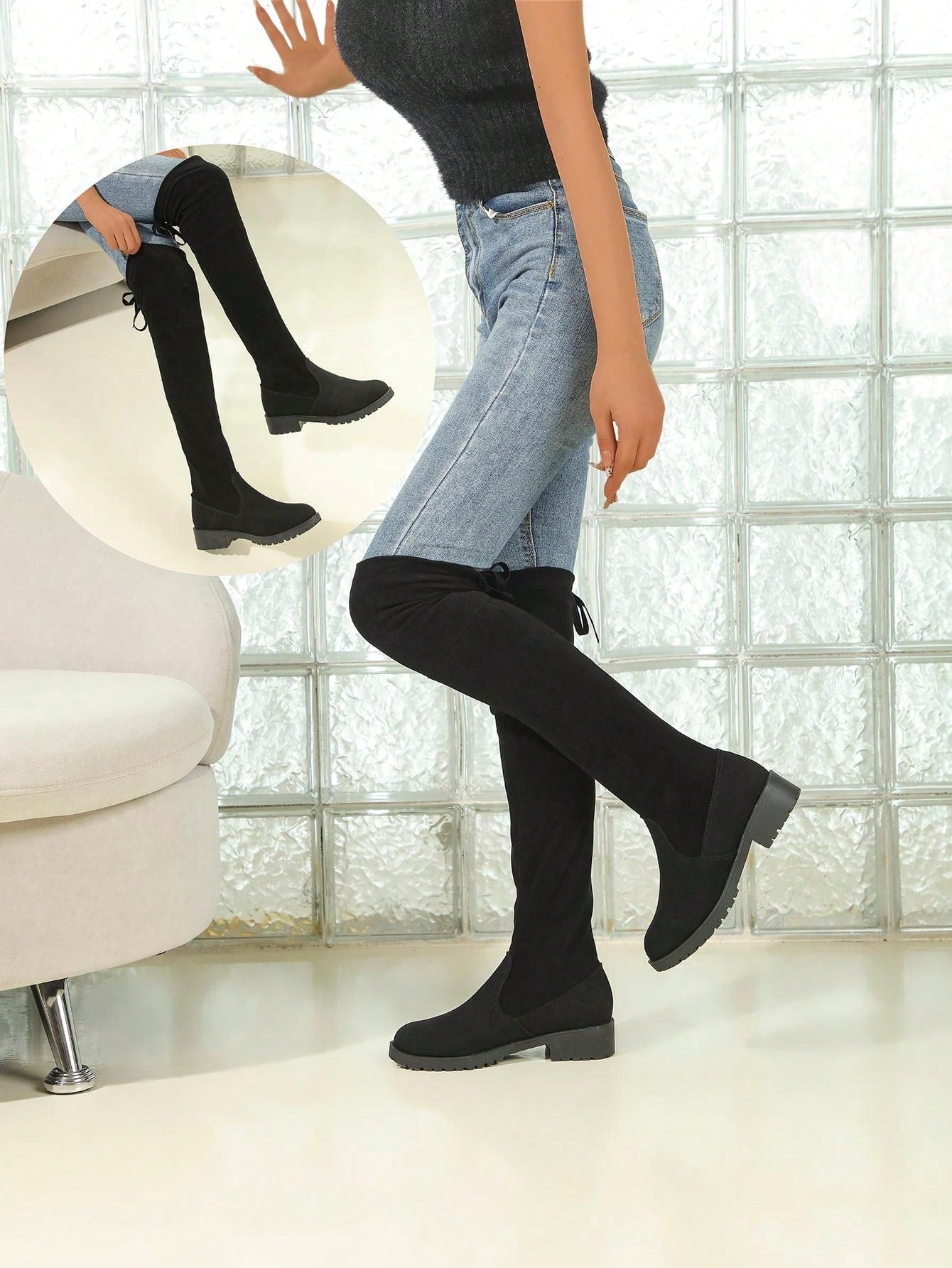 بوت طويلة حتى الركبة ذات كعب متوسط