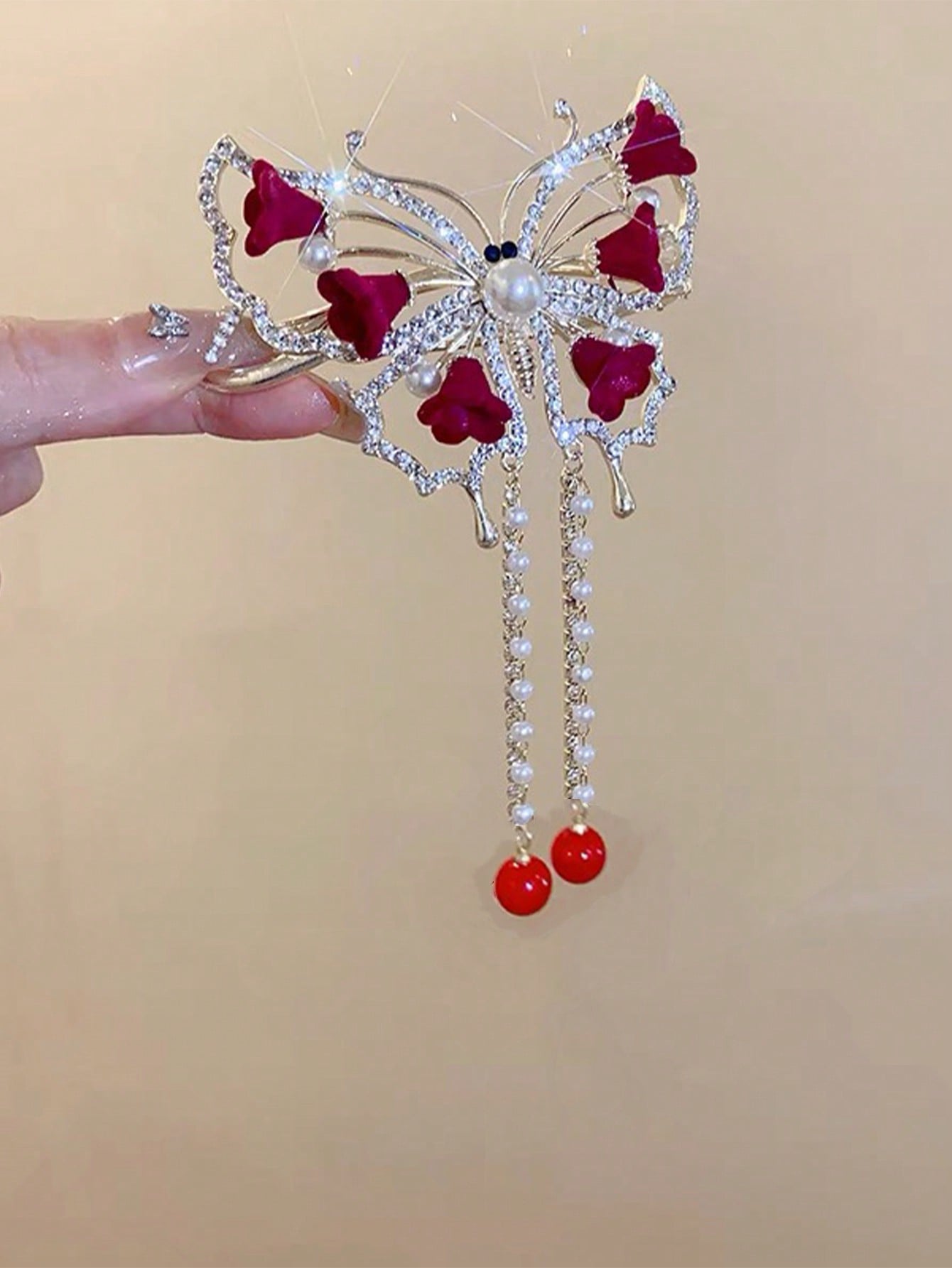 مقطع شعر خفاش ترتواز النسائي بحجر الراين، زنبقة الوادي الحمراء،لفافة الخصلات مناسب للارتداء اليومي والحفلات الأنيقة