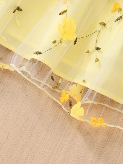 فستان حلو بدون أكمام مرصع بالطرز الزهري وحاشية