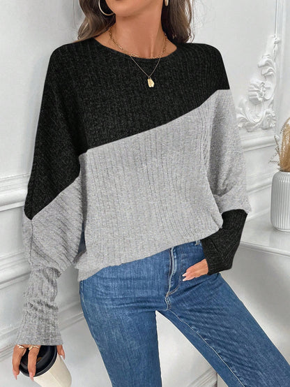 بلوزة رياضية فضفاضة ذات أكمام طويلة على شكل خفاش بألوان متباينة، للنساء