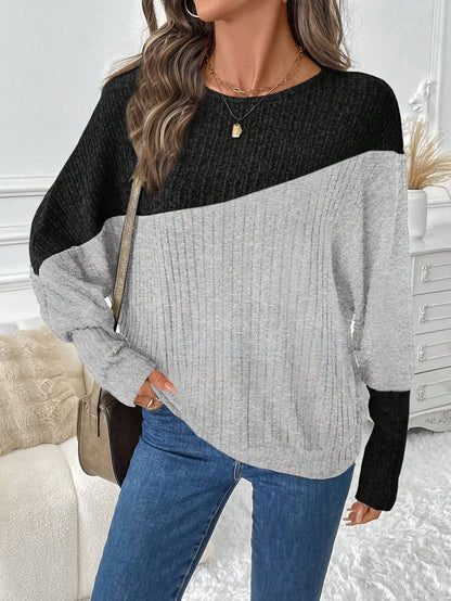 بلوزة رياضية فضفاضة ذات أكمام طويلة على شكل خفاش بألوان متباينة، للنساء