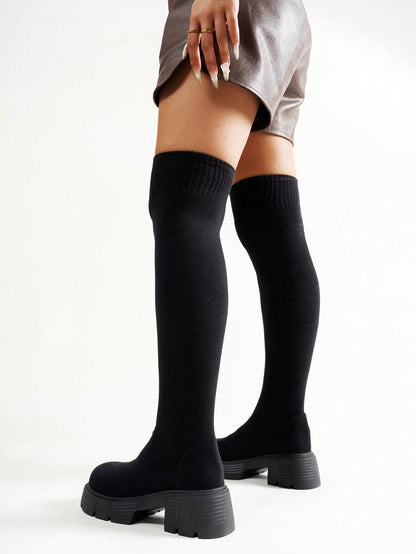 أحذية بوت نسائية فوق الركبة