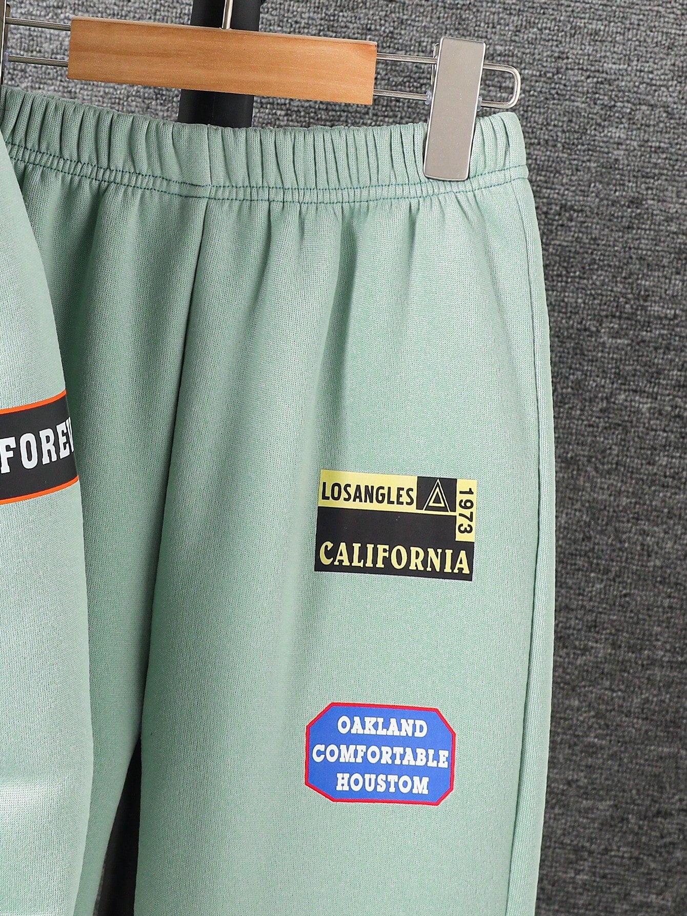 طقم ملابس من قطعتين هوديي بياقة فرائية وبنطلون رياضي للأولاد المراهقين