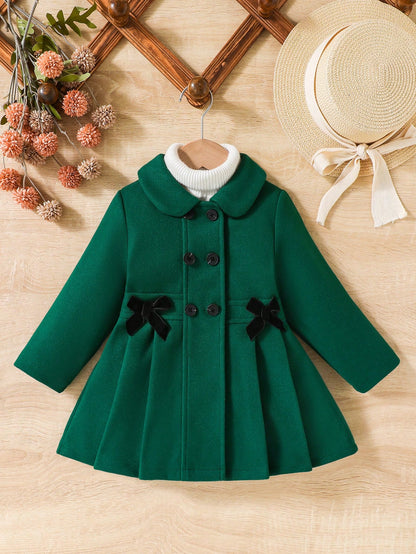 جاكيت بسيط للفتاة بأكمام طويلة وأزرار أمامية ومزين بفيونكة