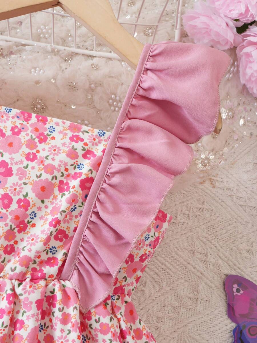 فستان الفتيات مزين بالحواف والطبعات الأزهار