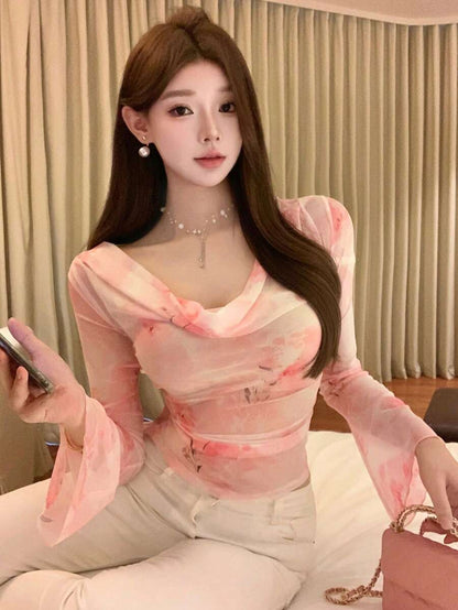 بلوزة طويلة الأكمام مطبوعة بطبعة زهرية