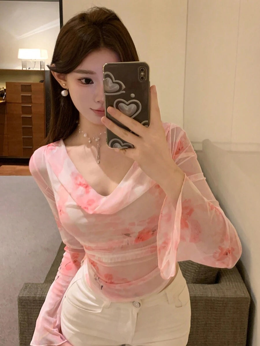 بلوزة طويلة الأكمام مطبوعة بطبعة زهرية