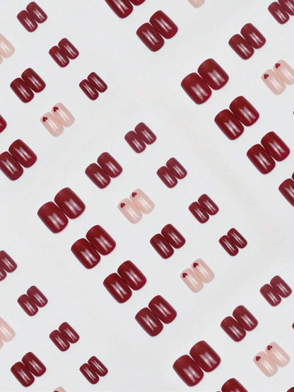 الأظافر الاصطناعية ذات الشكل المربع المتوسط باللون الأحمر