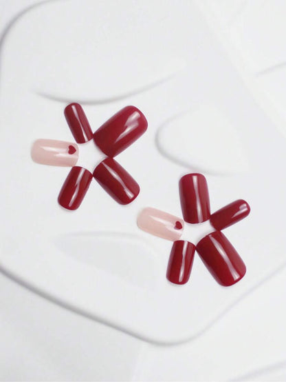 الأظافر الاصطناعية ذات الشكل المربع المتوسط باللون الأحمر