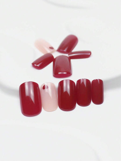 الأظافر الاصطناعية ذات الشكل المربع المتوسط باللون الأحمر