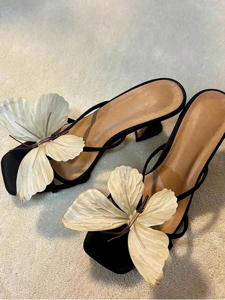 صندل كعب عالي ذو تصميم فريد مزين بالفراشة