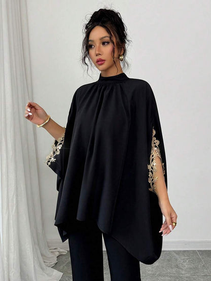 بلوزة نسائية أنيقة فضفاضة باللون الأسود