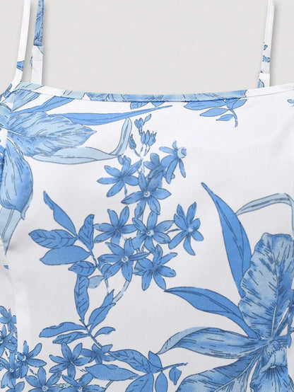 زوج (قطعتان) من ملابس المرأة البدينة تتكون من: بلوزة بسحّابة أماميّة وأكمام طويلة بلون واحد، وفستان كامي