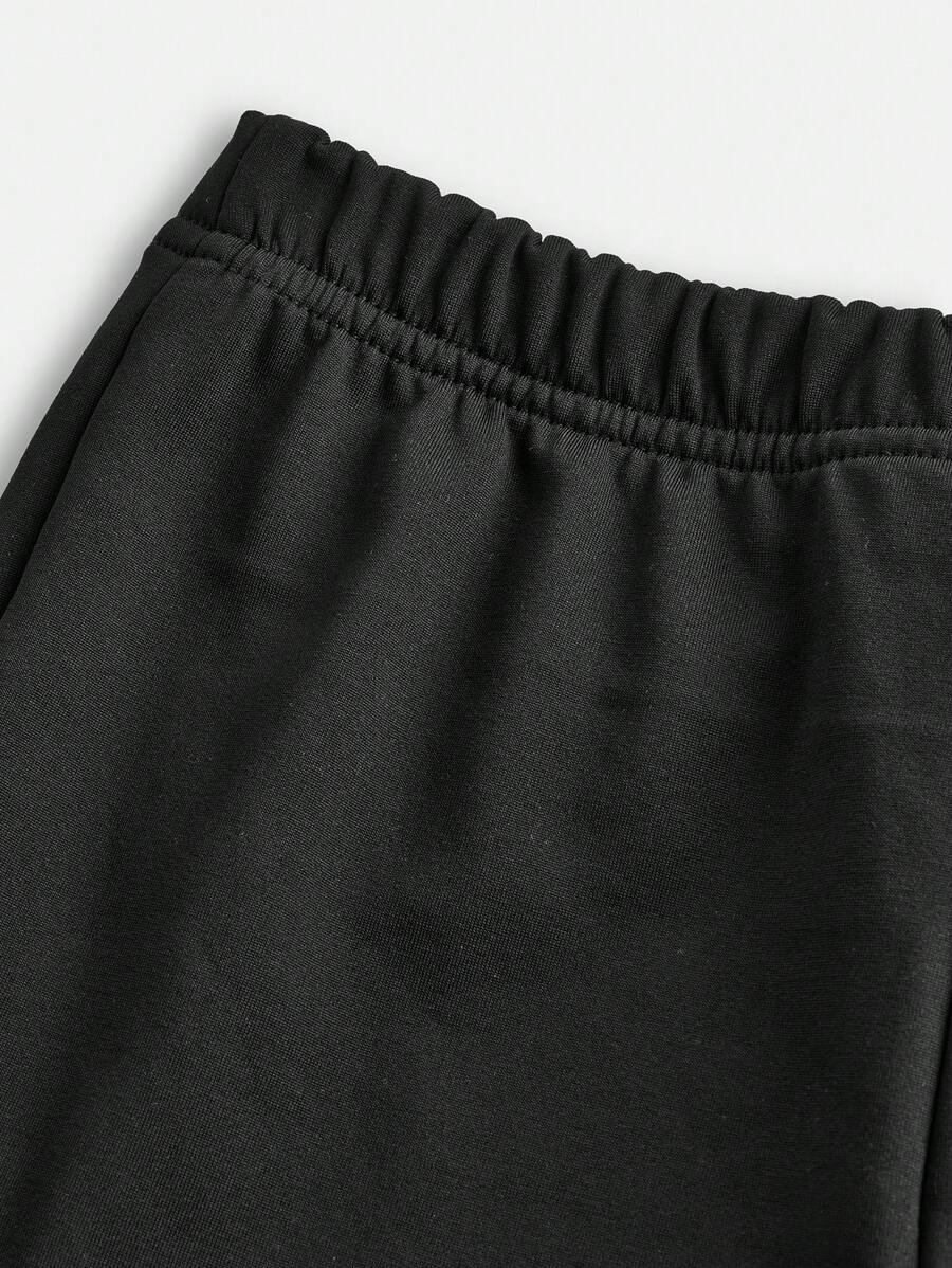 بلوزة بأكمام قصيرة فضفاضة مع بنطلون مطرز متموج قطعتان