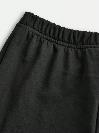 بلوزة بأكمام قصيرة فضفاضة مع بنطلون مطرز متموج قطعتان