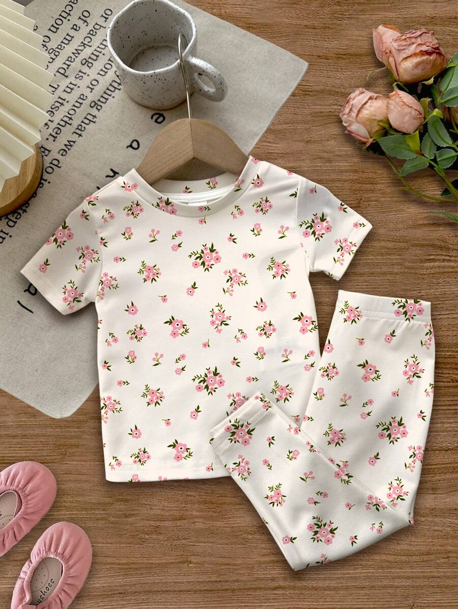 طقم ملابس علوية مفصل الرقبة قصير الأكمام وبنطلون