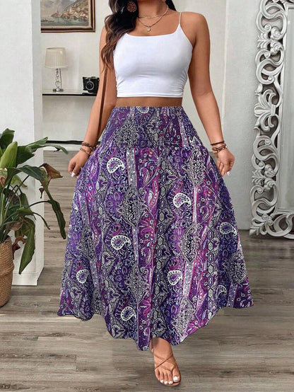 تنورة ماكسي للنساء البدينات بطبعة زهرية وباهيّة متدرجة الأطراف