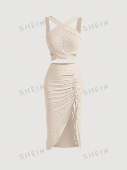 متقاطع كتف واسعة لباس علوي و رباط فتحة للفخذ تنورة